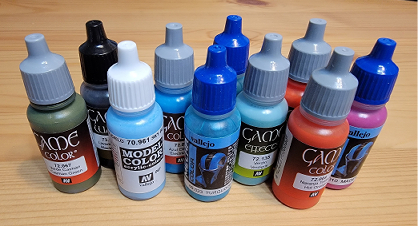 several bottles of paint, some of which may even be used on the kit in question